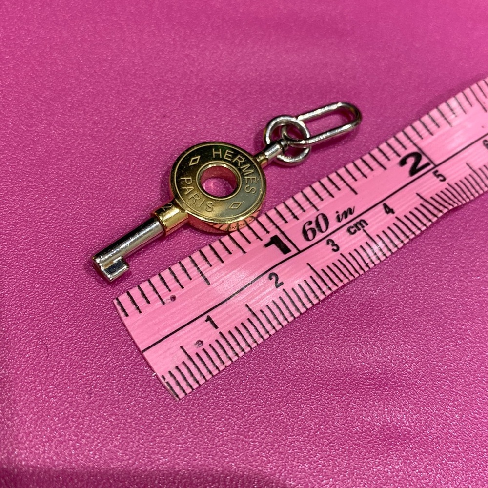 Hermes key pendant
